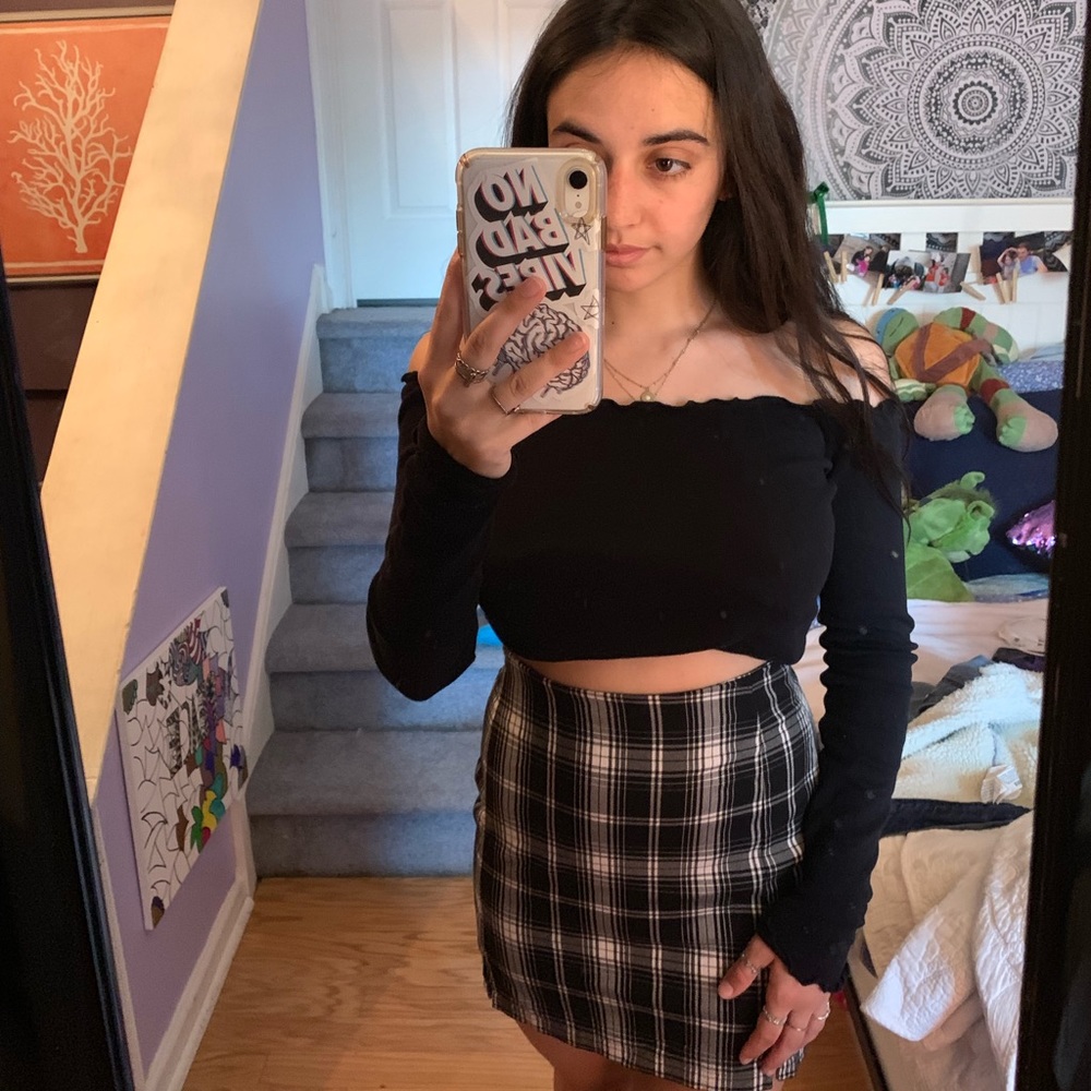 Off the shoulder black top with lettuce trim